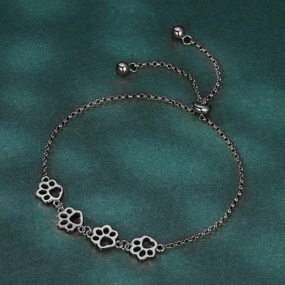 Pulsera ajustable de plata de ley con huella de pata de perro